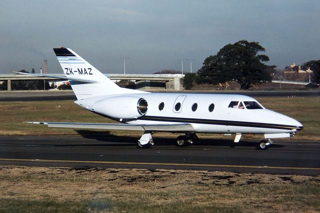 ZK-MAZ — - DASSAULT FALCON 100 - REG : ZK-MAZ (CN 213) - KINGSFORD SMITH SYDNEY NSW. AUSTRALIA - YSSY 27/6/1988 35MM SLIDE CONVERSION USING A LIGHTBOX AND A NIKON L810 DIGITAL CAMERA IN THE MACRO MODE.