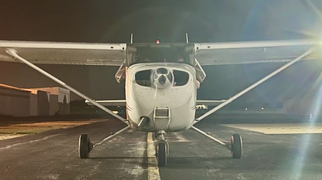 Cessna Skyhawk (N973HA) - N973HA, a 2005 Cessna 172S Skyhawk SP, taxiing in after a night flight. 6/15/22. 