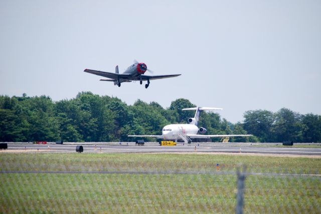 NANCHANG PT-6 (N29NL) - With the donated FedEx 727 in the background.