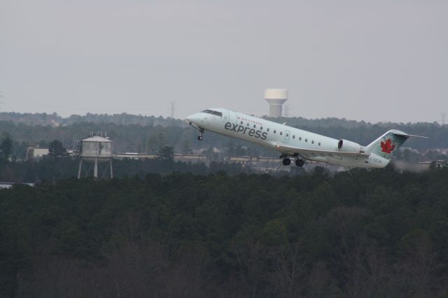 Canadair Regional Jet CRJ-100 (C-GZJA) - C-GZJA taking off runway 23R