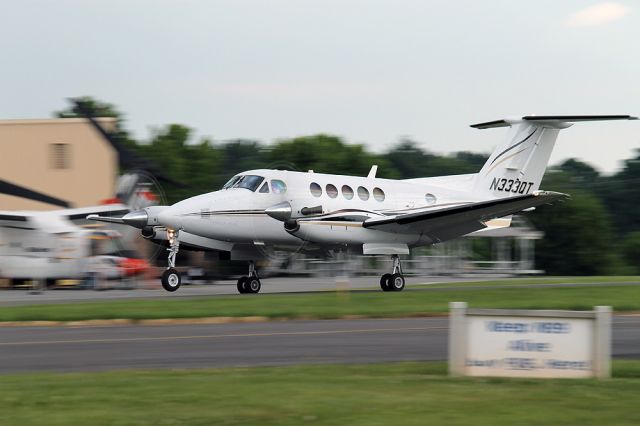 Beechcraft Super King Air 200 (N333QT) - Just touched down at KOQN