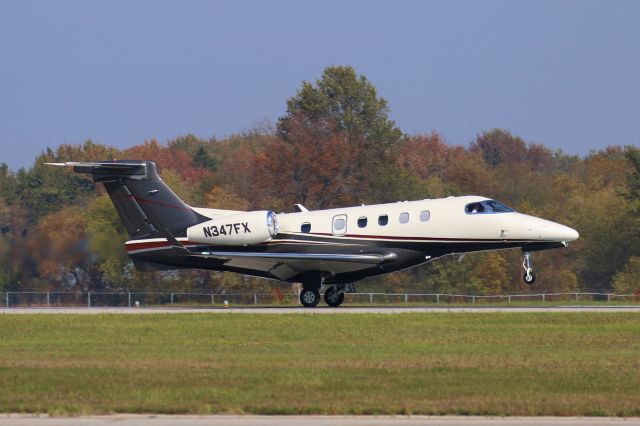 Embraer Phenom 300 (N347FX) - Landing Rwy 15, London, ON.