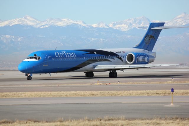 Boeing 717-200 (N949AT) - Just landing at DIA.