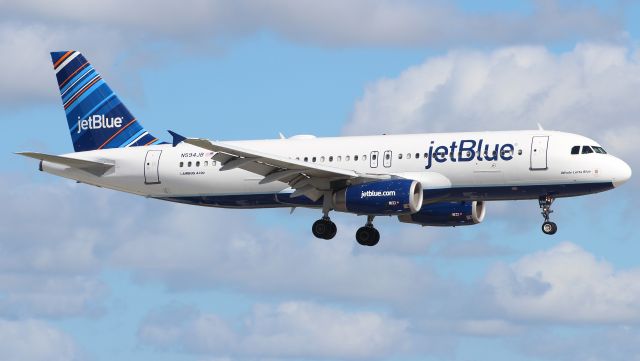 Airbus A320 (N594JB) - 06.10.2013 Landing at Fort Lauderdale International