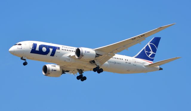 Boeing 787-8 (SP-LRF) - A LOT Boeing 787-800 landing on Runway 10C after a 9 hour flight from Warsaw, Poland. Taken from the Schiller Park Metra Station.