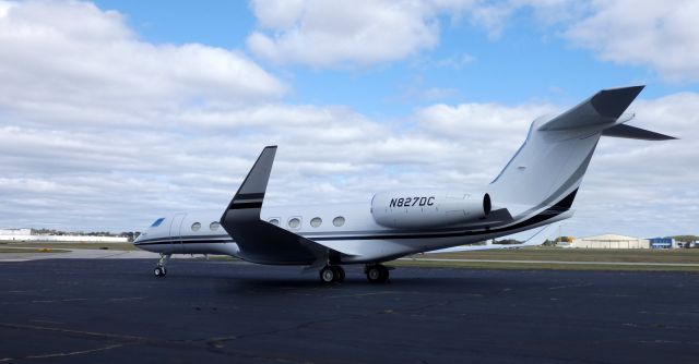 Gulfstream Aerospace Gulfstream G650 (N827DC) - Catching some tarmac time is this 2016 Gulfstream 650ER in the Autumn of 2019.