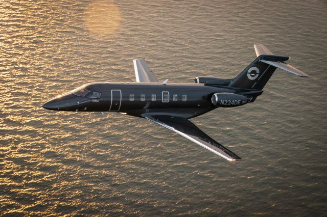 Pilatus PC-24 (N224DE) - Over Lake Michigan shoreline