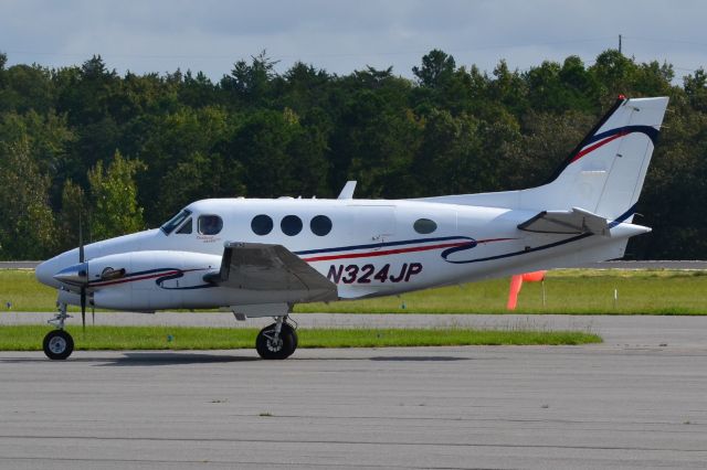 Beechcraft King Air 90 (N324JP) - CITY FLIGHT SERVICES LLC taxiing at KJQF - 9/30/18