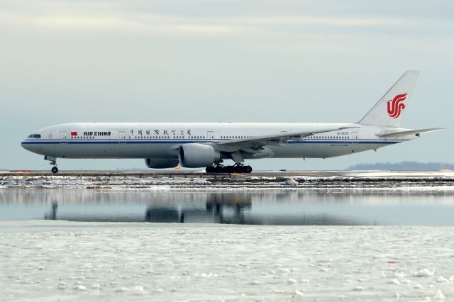 BOEING 777-300 (B-2031) - China Air taxiing for departure to JFK after being diverted due to ice.