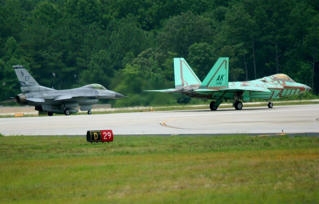 Lockheed F-22 Raptor (N146) - Lockheed Martin Marietta,, production model 146 on her first takeoff role.. followed by the   f16 chase plain... always a treat to hear and see..