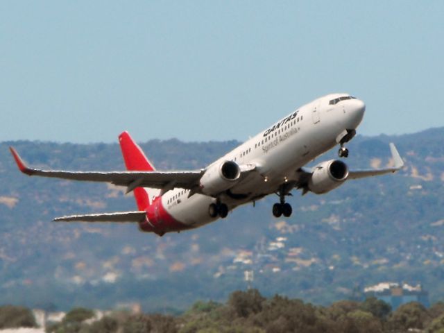 Boeing 737-800 (VH-VYE) - Getting airborne off runway 23.