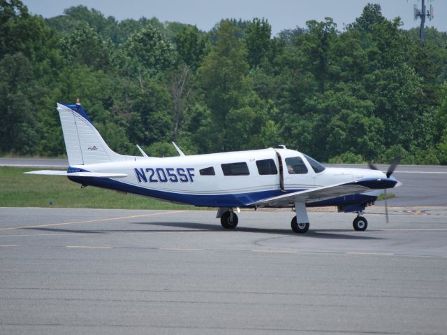 Piper Saratoga (N205SF) - SER LOGISTICS LLC taxiing to runay 2 at KJQF - 6/29/12