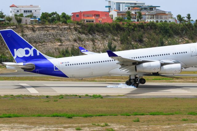 Airbus A340-300 (F-GLZN) - Touch down for the Joon on 04-08-2018 at TNCM St Maarten.