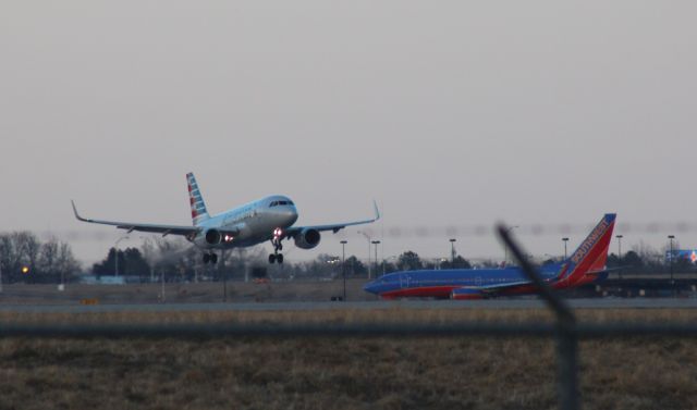 Airbus A319 (N9012) - 022414 AA from KDFW. SWA B737 N764SW waiting to depart