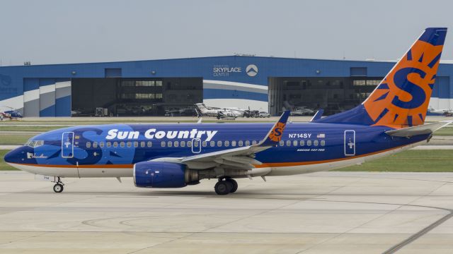 Boeing 737-700 (N714SY) - Lake Vermilion Stamp taxiing to depart 13Rbr /5/19/17