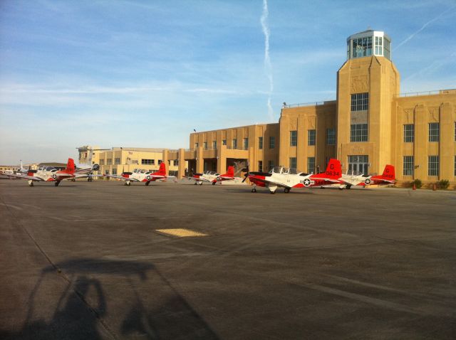 — — - T-34s in front of the recently renovated terminal in New Orleans.