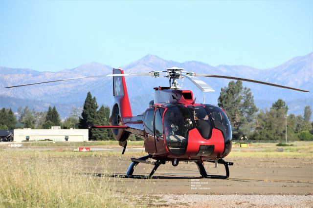 Eurocopter EC-130 (N413RX) - KRDD - REACH EC30 at the new Redding base - working out of an existing older building just south of the PHi Air Medical Base adjacent to the Redding Dragstrip gate/entrance. This is a new Helicopter base for Reach here at Redding and they are using 5th wheel trailers for crew quarters. A fuel truck is onsite and as you can see in the other photo - portable air conditioning units - in which they will need daily soon! I noticed about 4 weeks ago equipment at this location but did not drive around the back side of RDD to see what this was - a new REACH base. May 2020