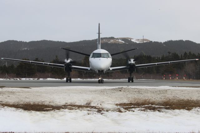 Saab 340 (C-FKSL) - Magnifique angle, Avec le paysage madelinot,  PSC a son décollage sur la piste 07 à CYGR pour CYGP.. le 13 Mars2024.