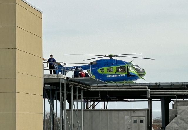KAWASAKI EC-145 (N145NK) - BEEBE HEALTHCARE HELIPAD-LEWES, DELAWARE, USA-MARCH 20, 2025: A medevac helicopter is seen by RF at approximately 1151 hrs. putting a patient on board shortly before taking off from the rooftop helipad of Beebe Healthcare, located on Savannah Road in Lewes, Delaware.