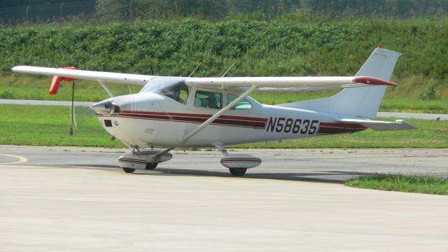 Beechcraft Bonanza (33) (N58635) - Plane was taxiing into the airport. I was in the conference room.