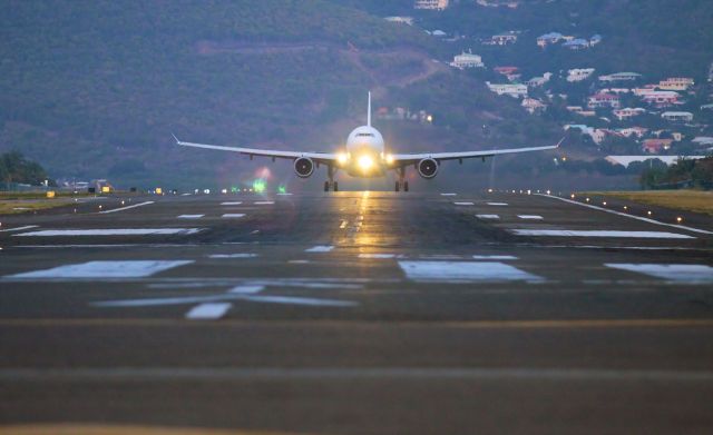 Airbus A330-200 (F-OFDF) - Air Caribe doing there normal late departure from St marten to france.