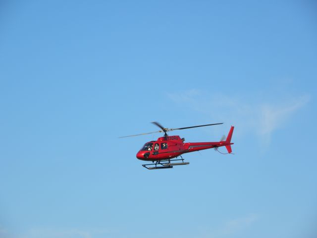 N130RU — - N134RU leaving BLM. I love the nice red color of it.