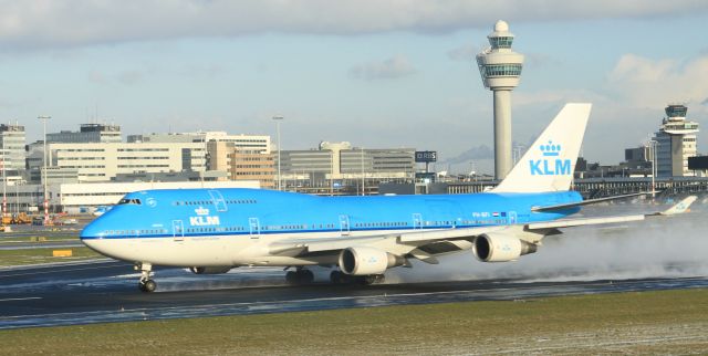 Boeing 747-200 (PH-BFI) - Combi takeoff after a recent shower.