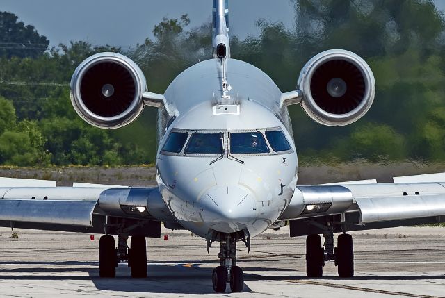 Canadair Regional Jet CRJ-900 (N533AE) - JIA5511 turning off RWY 24R after arriving from Dallas-Fort Worth Int'l -KDFW on 23 Jun 2025.