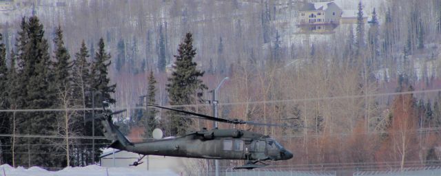 — — - Blackhawk lifting off.