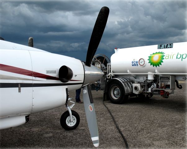 Beechcraft King Air 90 (ZS-OAE) - Refuelling at Quelimane, Mozambique