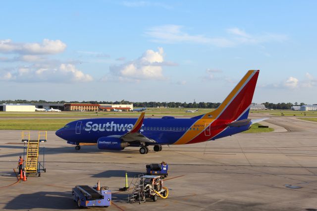 Boeing 737-700 (N7877H) - Southwest Airlines (WN) N7877H B737-7Q8 [cn29359]br /Houston Hobby (HOU). Southwest Airlines flight WN1976 just arrived from New Orleans Louis Armstrong  (MSY).br /Taken from the Terminal br /br /2017 08 11br /a rel=nofollow href=http://alphayankee.smugmug.com/Airlines-and-Airliners-Portfolio/Airlines/AmericasAirlines/Southwest-Airlines-WNhttps://alphayankee.smugmug.com/Airlines-and-Airliners-Portfolio/Airlines/AmericasAirlines/Southwest-Airlines-WN/a