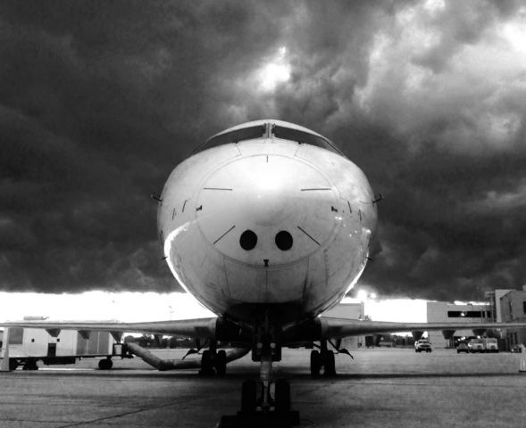 Canadair Regional Jet CRJ-200 (N602XJ) - Sitting at the gate as a storm rolls over!