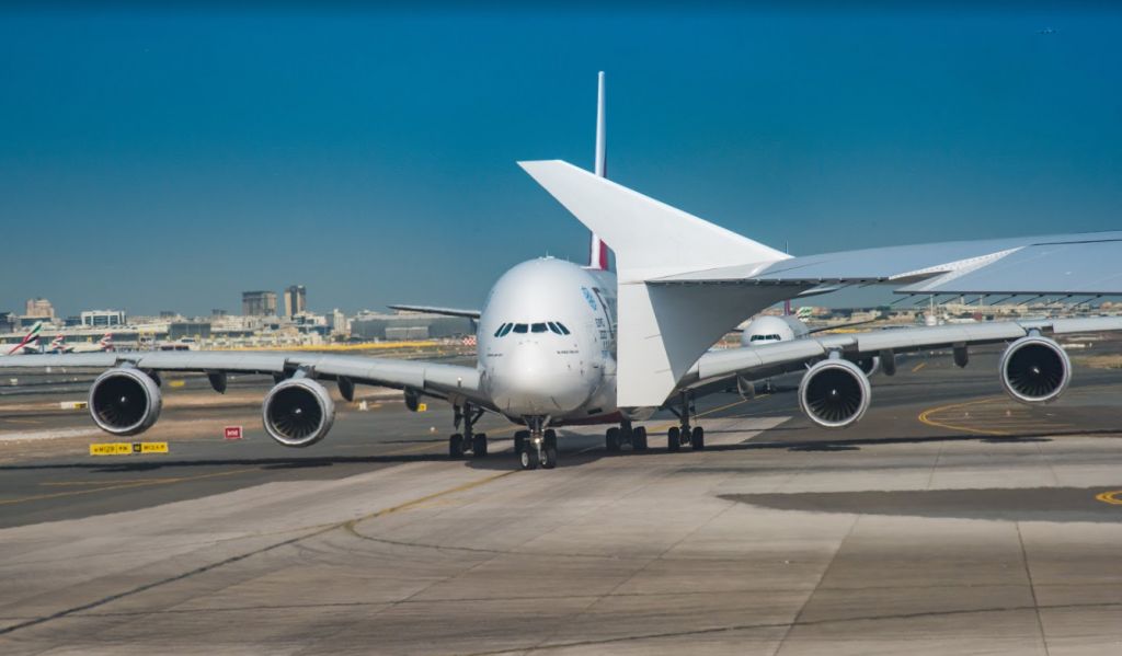 Airbus A380-800 (A6-EOA) - Holding in position on the runway with another Airbus A380 holding short and a Boeing 777 right behind