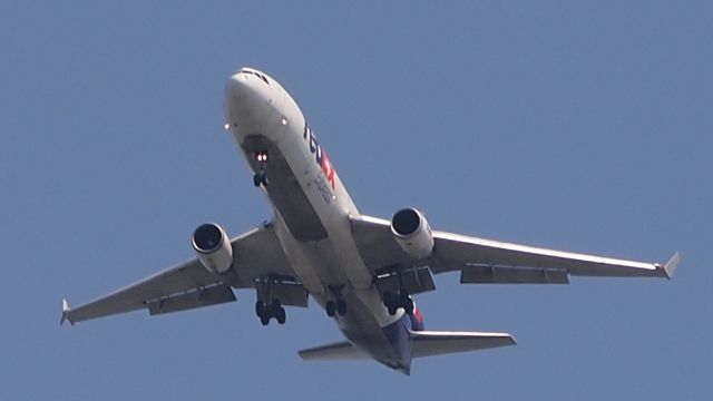 Boeing MD-11 (N605FE) - "April Star" on final to 18C at KMEM.