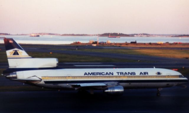 Lockheed L-1011 TriStar (N194AT) - ATA L1011 departing Boston Logan at dusk on June 27, 1997. 