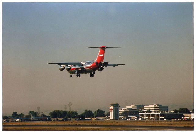 — — - San Jose, CA apprx photo date 1989. Note no terminal A yet. This taken at the 30L utility boxes when one could stand here all day and take photos and nobody cared. In this photo, a US Air BAe 146 is on final to 30L from most likely LAX