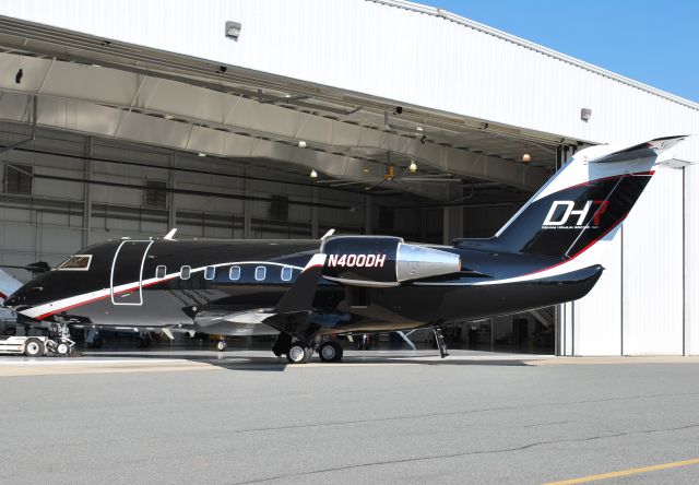 Canadair Challenger (N400DH) - DH MOTORSPORTS LLC (NASCAR driver Denny Hamlin) the Joe Gibbs Racing  hangar at KJQF - 2/20/12