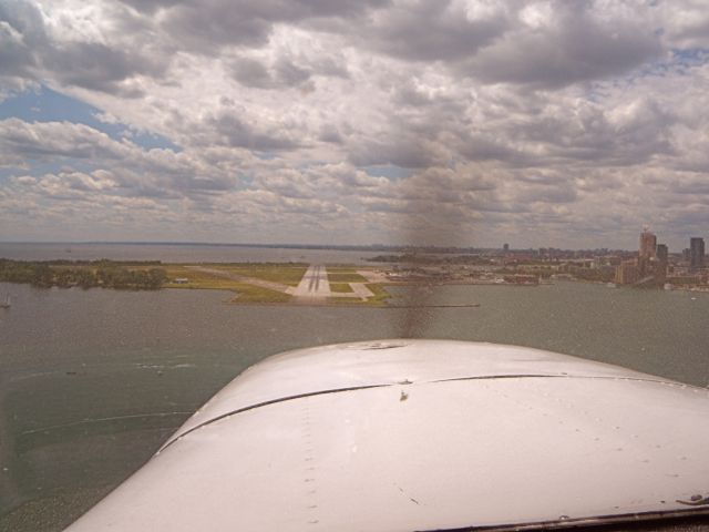 — — - Short final RWY26 CYTZ