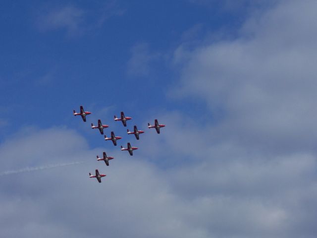 — — - "Swept Delta"   formation over CFB Comox, BC    The Snowbirds Demonstration Team 431 Squadron is a Canadian icon comprised of members of the Canadian Forces