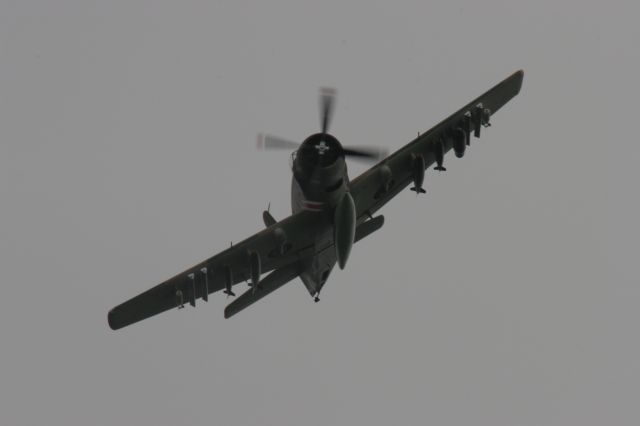 — — - Douglas Skyraider Makes a Bombing Run at EAA 2010