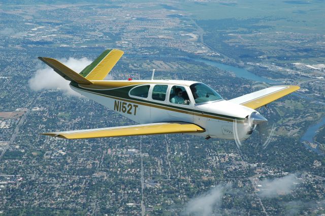 Cessna 152 (N152T) - Taken from my Six, Mark is flying his V35, approaching Folsom Lake, CA.<br>Photo copyright Andy Robinson