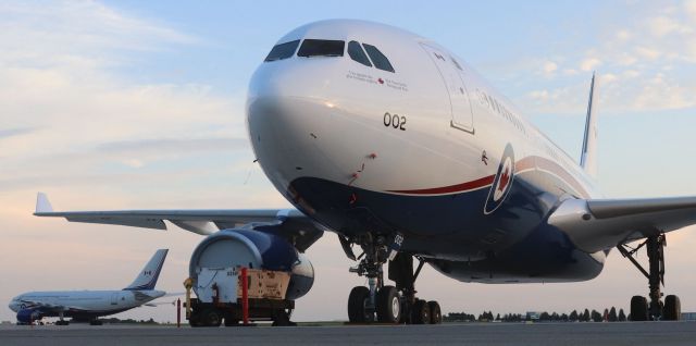 Airbus A330-200 (33-0002) - The newest aircraft in the Royal Canadian Air Force.  CC-330 “Husky” (330002) is the first of nine Multi Role Tanker Transports based on the Airbus A330-200 for the RCAF.  This aircraft is wearing VIP livery and is parked not far from the aircraft it is replacing: CC-150 "Polaris" (15001).  “002” was former Kuwait Airways 9K-APC before refit at Airbus. 