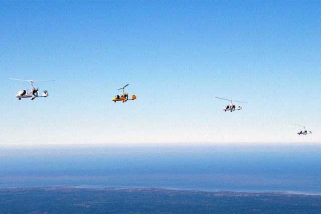 Unknown/Generic Ultralight autogyro (N216MG) - 4 Magni gyroplanes with the Gulf in the background