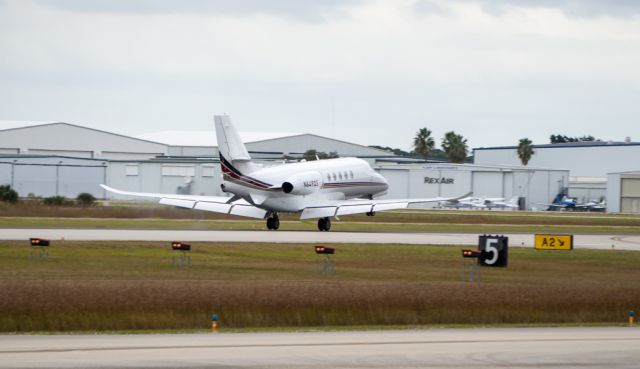 Cessna Citation Latitude (N649QS) - Touches down runway 5