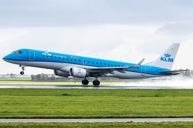 PH-EZK — - Taking off on after the rain! Runway 36L.