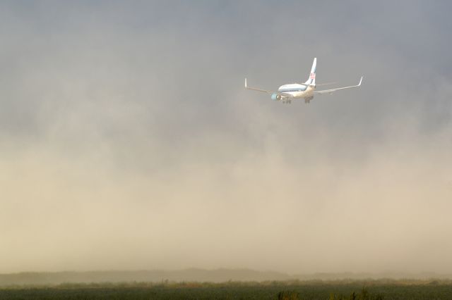 Boeing 737-700 (N278EA) - Mike Pence arrives in Mesa for a rally but not before a dust storm engulfs the airport.