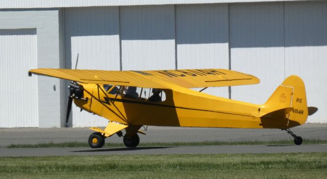 Piper NE Cub (N6114H) - Taxiing for departure is this 1946 Piper J3C-65 Cub in the Spring of 2023.