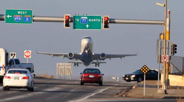 Embraer 170/175 — - always an impressive sight. an optical illusion at runway 35 looking north.  