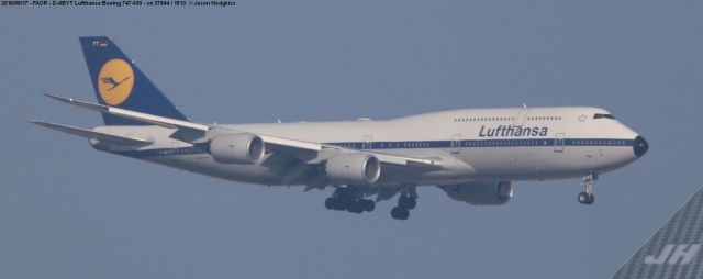 Boeing 747-200 (D-ABYT) - Landing 03R, taken from 03L location with 600mm zoom, and finally got it with the correct era black nose cone!