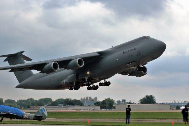 Lockheed C-5 Galaxy (N70042) - Cloudy Day Departure Oshkosh 2016.